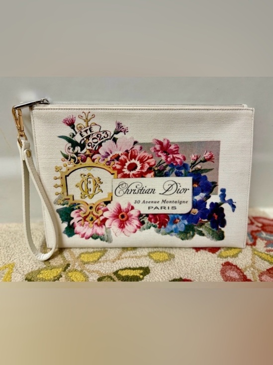 Dior Handbags - CHRISTIAN DIOR Never Worn Limited Edition White Floral Print Canvas Wristlet